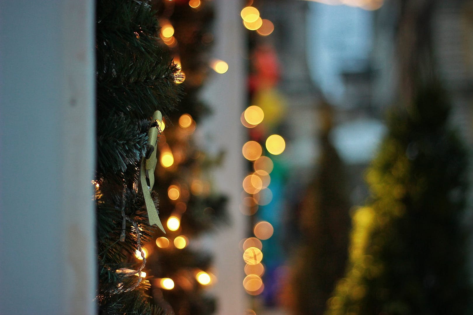 christmas decoration and glowing garland in room